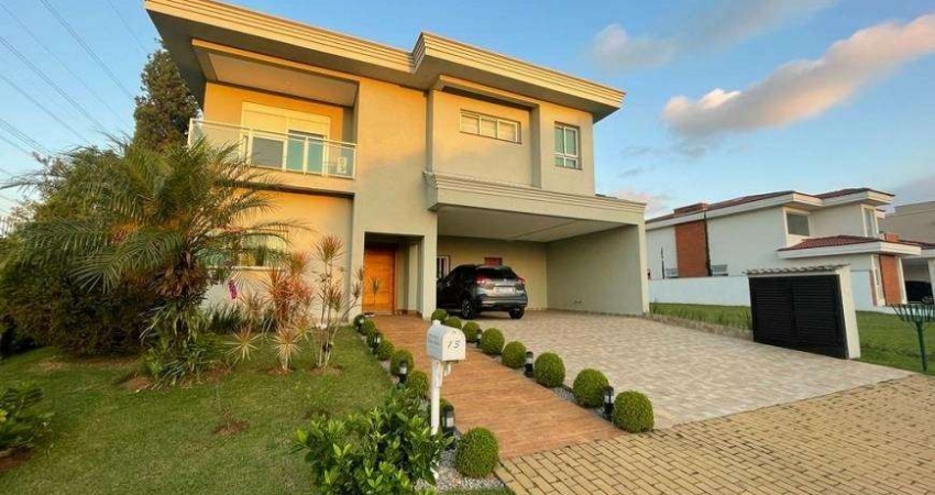 Magnífica casa de alto padrão em condomínio Alphaville, 4 quartos, 4 suítes, 6 banheiros, 4 vagas, 445m² em Santana de Parnaíba-SP.