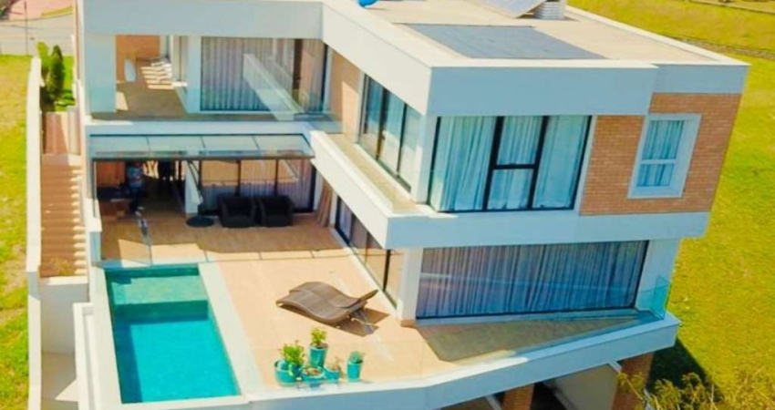 Casa de luxo em condomínio: 4 quartos, 3 suítes, 4 banheiros, 4 vagas em Tamboré, Santana de Parnaíba-SP. 500m² de área!