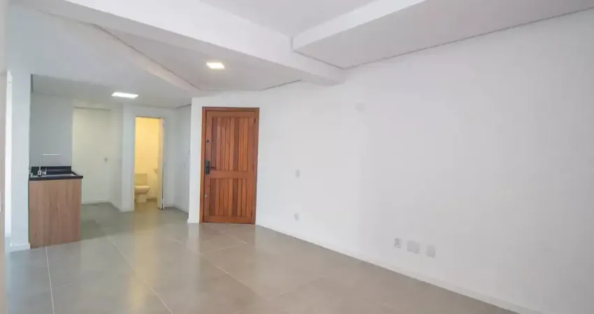 Apartamento de dois dormitórios, sacada com churrasqueira