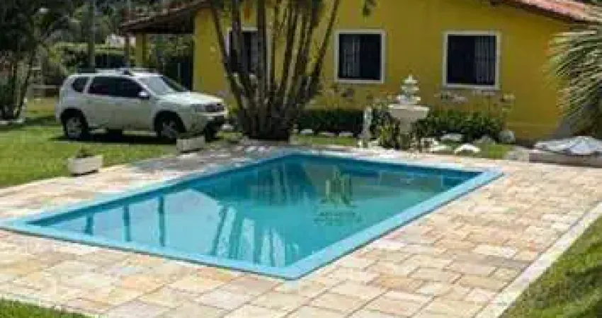 Casa com 4 dormitórios à venda, 215 m² por R$ 990.000,00 - Caputera - Arujá/SP