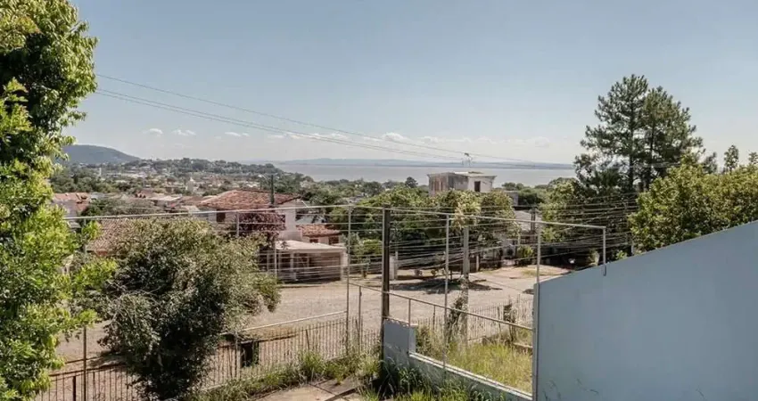 Casa com 3 quartos à venda na Avenida Leonardo Carlucci, 140, Espírito Santo, Porto Alegre