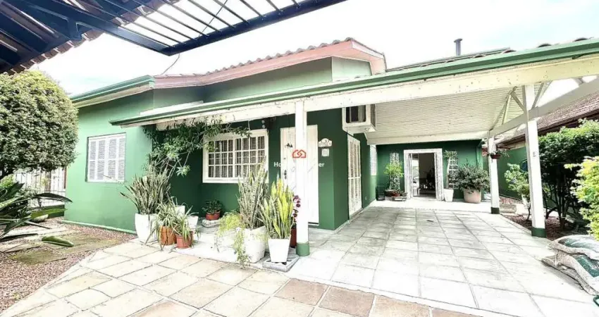 Casa com 262m² | suíte com lareira | 4 dormitórios no bairro Bela Vista em Estância Velha.