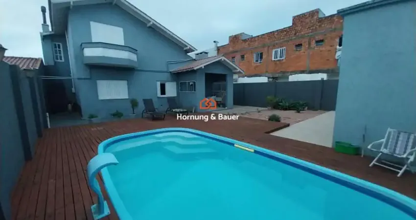 Casa com piscina à venda em capão da canoa, no bairro santo antônio