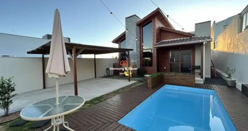 Casa estilosa e aconchegante com piscina à venda em Estância Velha no bairro Lago Azul.