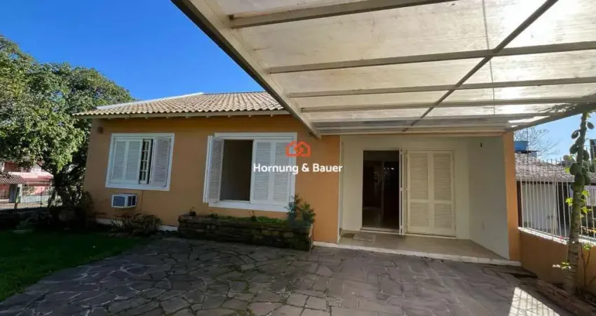 Casa à venda em Novo Hamburgo, Vila Nova - Com churrasqueira, suíte e pátio