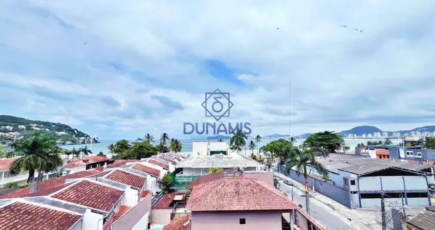 Apartamento a venda na praia da enseada com sacada gourmet e vista para o mar