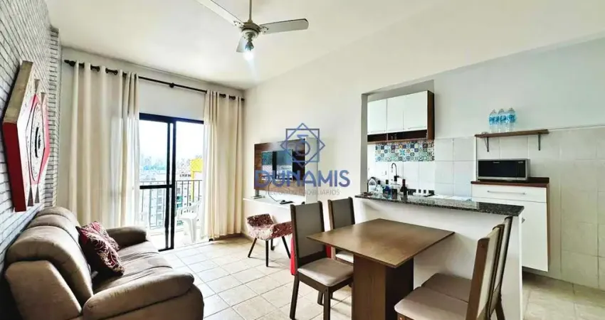 Apartamento reformado na praia da enseada - prédio com lazer