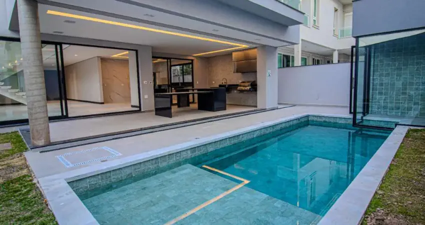 Casa de condomínio com 400 m², 4 quartos sendo 4 suítes à venda no bairro alphaville.