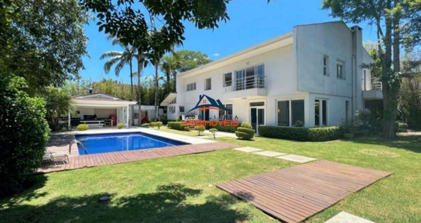 Imponente casa em condomínio à venda ou locação em Jandira-SP, bairro Jardim do Golf I: 4 quartos, 4 suítes, 3 salas, 6 banheiros, 6 vagas de garagem, 541,65 m².
