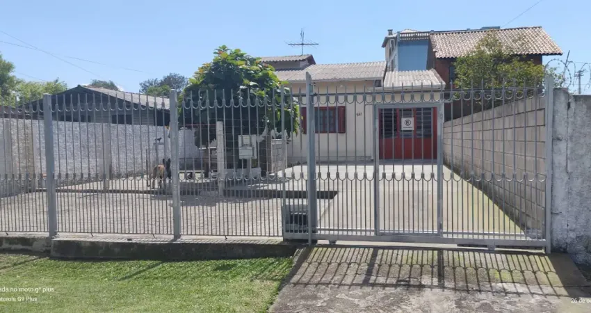 Vende bela casa  de alvenaria com  amplo terreno   no parque santo inácio,  esteio.