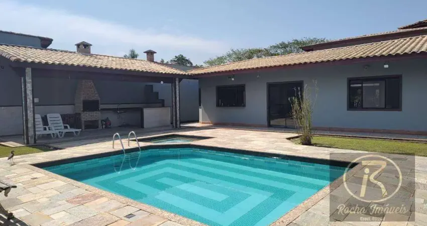 Casa de alto padrão à venda em peruíbe/sp – espaço, sofisticação e conforto no litoral!