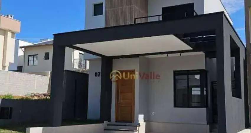 Casa com 3 dormitórios à venda, 134 m² por R$ 629.000 - Chácara Belo Horizonte - Taubaté/SP