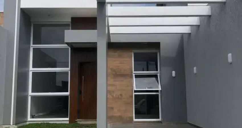 G1024 - Belíssimo geminado em ótima localização no Centro de Imbé