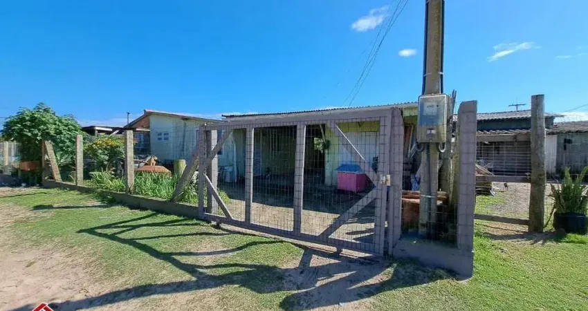 C180  - residência de madeira localizada em região de moradores