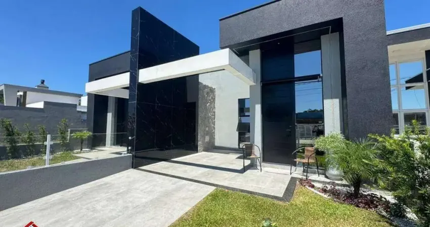 C1040 - Belíssima residência de alto padrão localizada no Centro de Imbé