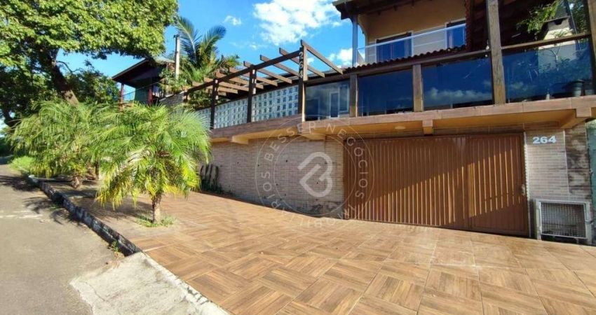 Casa com 4 dormitórios para alugar, 350 m² por R$ 5.070,00/mês - Camboim - Sapucaia do Sul/RS