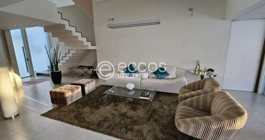 Casa em condomínio à venda, 4 quartos, 4 suítes, 2 vagas, Jardim Karaíba - Uberlândia/MG