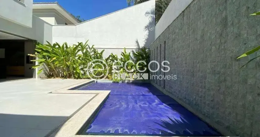 Casa em condomínio à venda, 4 quartos, 3 suítes, 6 vagas, Jardim Karaíba - Uberlândia/MG
