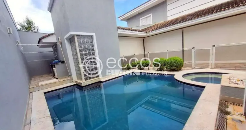 Casa em condomínio à venda, 4 quartos, 4 suítes, 2 vagas, jardim das palmeiras - uberlândia/mg