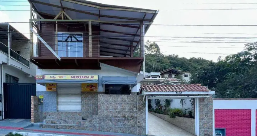 Terreno com 2 casas e 2 salas comerciais no bairro fazenda em itajaí