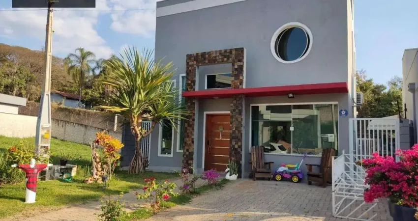 Casa com 3 dormitórios à venda, 158 m² por R$ 1.200.000,00 - Condomínio Portal do Bosque - Louveira/SP