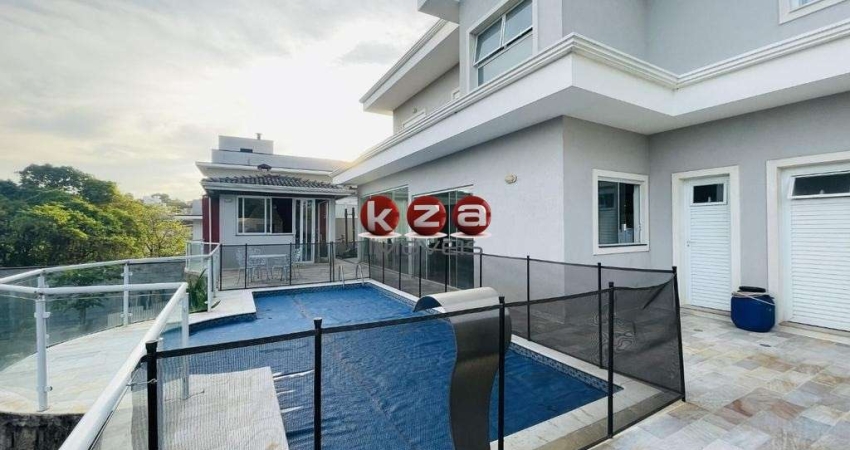 Casa de luxo no Condomínio Terras de Santa Teresa em Vinhedo, com 4 suítes, 3 salas e 350m² de área privativa. Venha conferir!