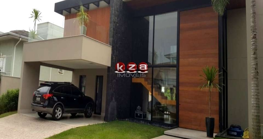 Luxuosa casa de alto padrão no Condomínio Portal do Lago em Valinhos-SP: 3 suítes, 3 salas, 5 banheiros, 4 vagas de garagem, 454m².
