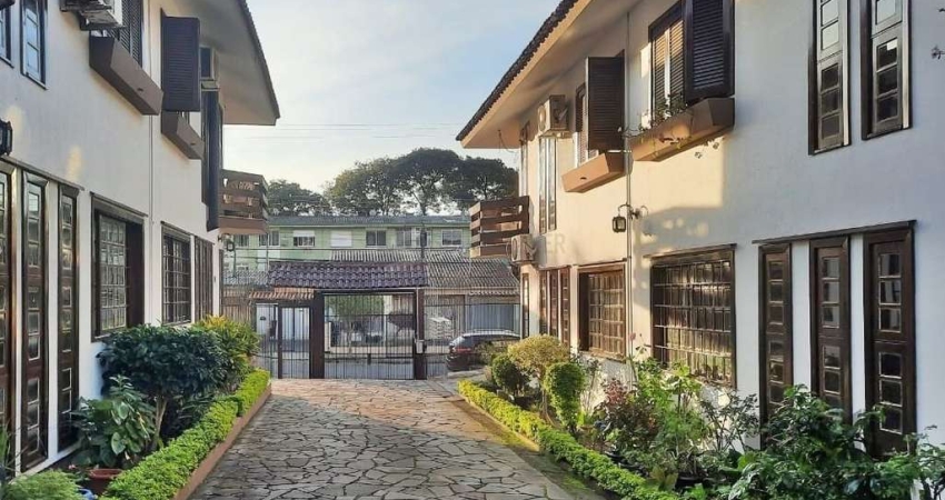 casa em condomínio com 3 dormitórios, sendo 1 suíte e vaga para dois carros no bairro Tristeza