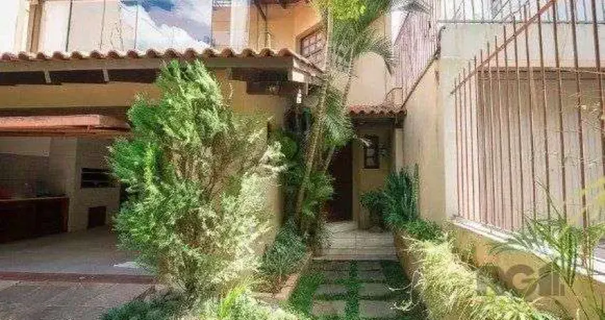 Casa com 4 quartos à venda na Rua Coronel Paulino Teixeira, 384, Rio Branco, Porto Alegre