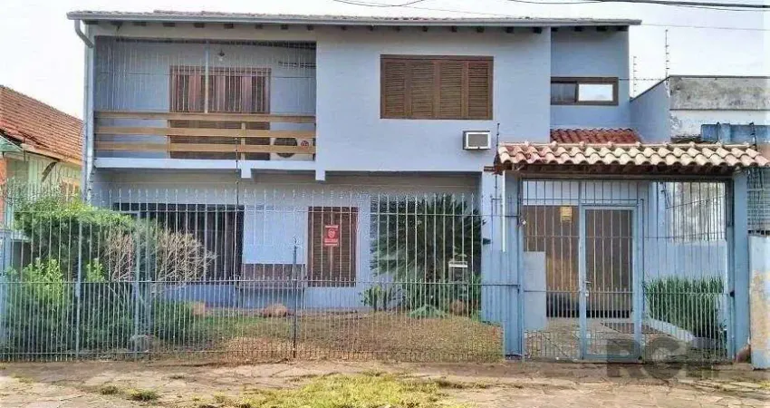 Casa com 3 quartos à venda na Rua Vítor Valpírio, 539, Anchieta, Porto Alegre