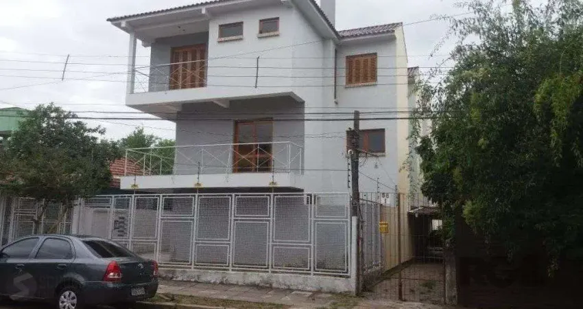Casa com 3 quartos à venda na Rua Jamil Antônio José, 100, Nonoai, Porto Alegre