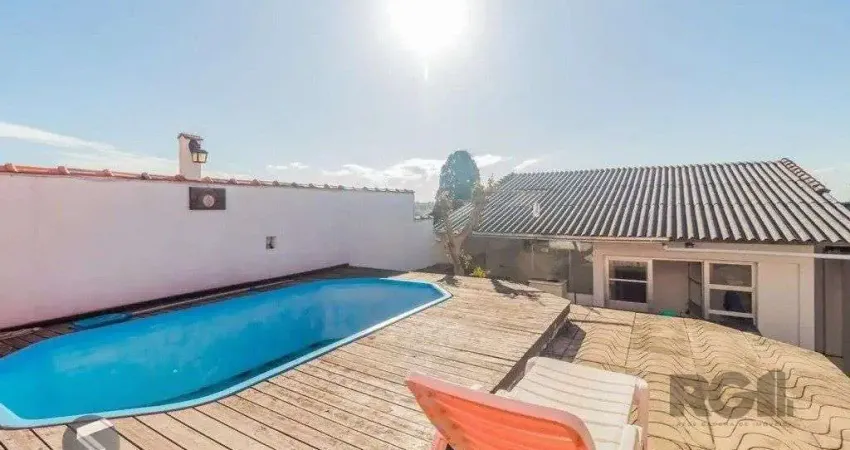 Casa com 3 quartos à venda na Rua Santiago Dantas, 308, Cascata, Porto Alegre