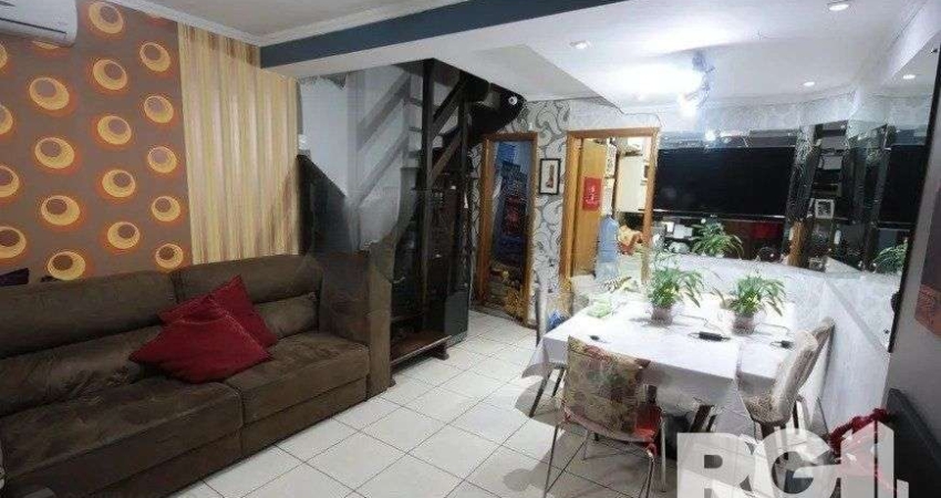 Casa residencial com 3 dormitórios 90m² privativos, e 2 vagas à venda no bairro Parque Santa Fé em Porto Alegre