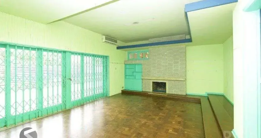 Casa com 5 quartos à venda na Rua Coronel Paulino Teixeira, 466, Rio Branco, Porto Alegre