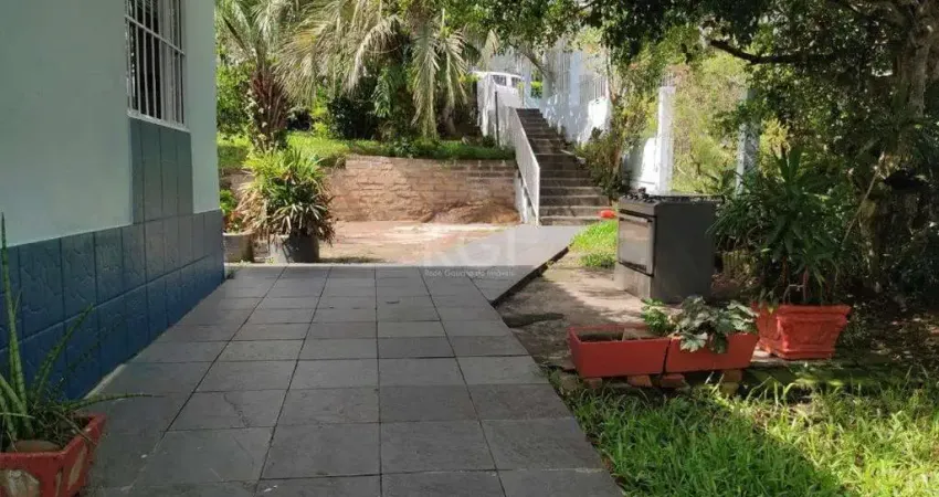 Casa com 3 quartos à venda na Rua Padre João Batista Reus, 2848, Camaquã, Porto Alegre