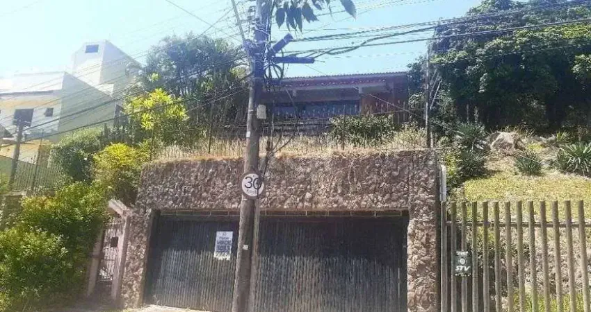 Casa com 5 quartos à venda na Rua Alcebíades Antônio dos Santos, 359, Nonoai, Porto Alegre