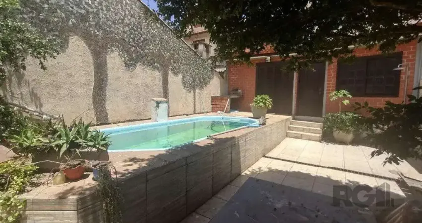 Casa com 4 quartos à venda na Rua Laguna, 264, Cavalhada, Porto Alegre