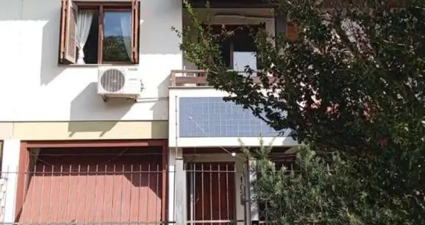 Casa em condomínio fechado com 3 quartos à venda na Rua Itapitocaí, 1129, Cristal, Porto Alegre