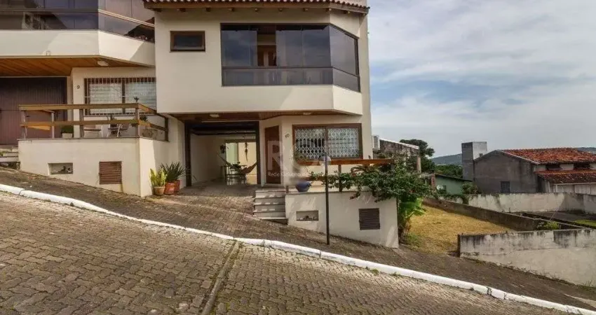 Casa em condomínio fechado com 3 quartos à venda na Rua Alcebíades Antônio dos Santos, 689, Nonoai, Porto Alegre