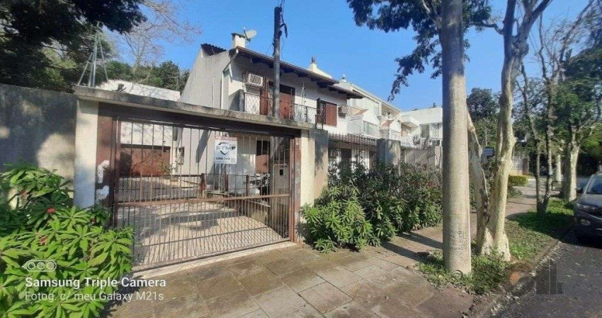 Casa com 4 quartos à venda na Avenida Fábio Araújo Santos, 1302, Nonoai, Porto Alegre
