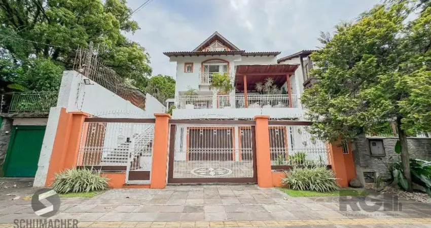 Casa com 4 quartos à venda na Avenida General Barreto Viana, 680, Chácara das Pedras, Porto Alegre