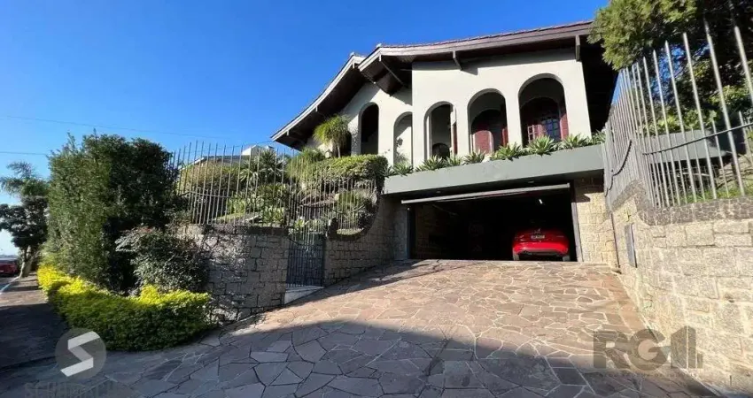 Casa em condomínio fechado com 4 quartos à venda na Rua Alcebíades Antônio dos Santos, 428, Nonoai, Porto Alegre