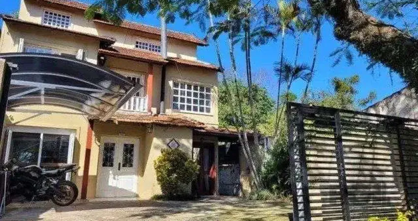 Casa com 4 quartos à venda na Rua Doutor Mário Totta, 1633, Tristeza, Porto Alegre