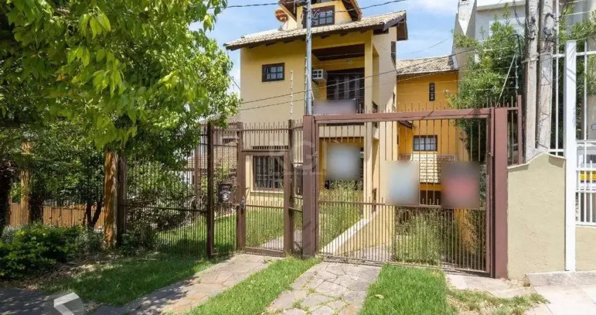 Casa com 3 quartos à venda na Rua Josué Guimarães, 256, Espírito Santo, Porto Alegre