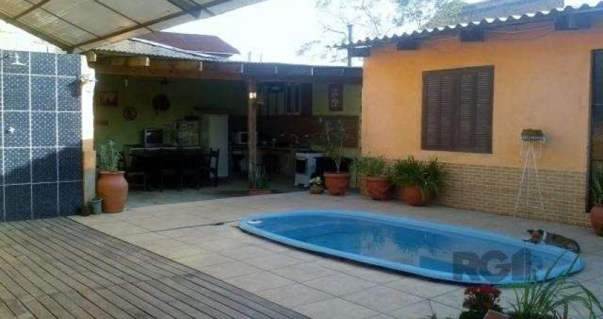 Casa com 4 quartos à venda na Rua Paulo Rubilar de Farias, 281, Restinga, Porto Alegre