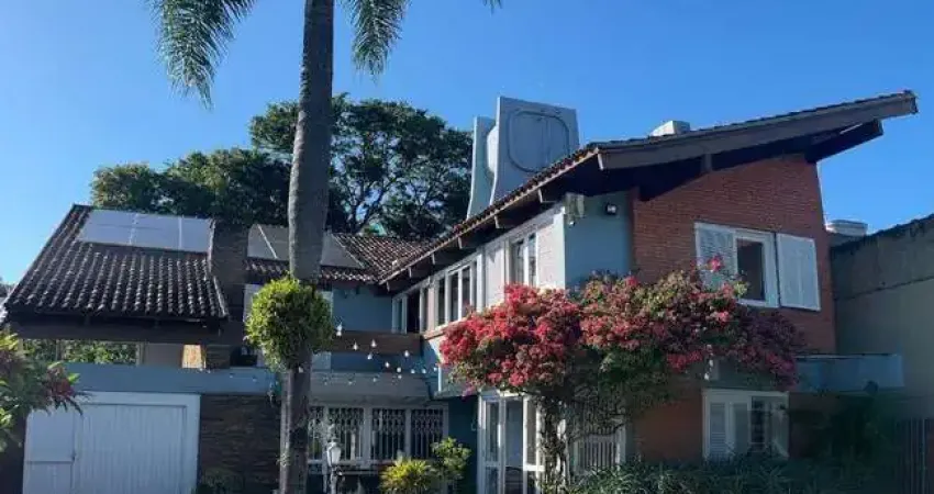 Casa com 4 quartos à venda na Rua Catumbi, 454, Medianeira, Porto Alegre