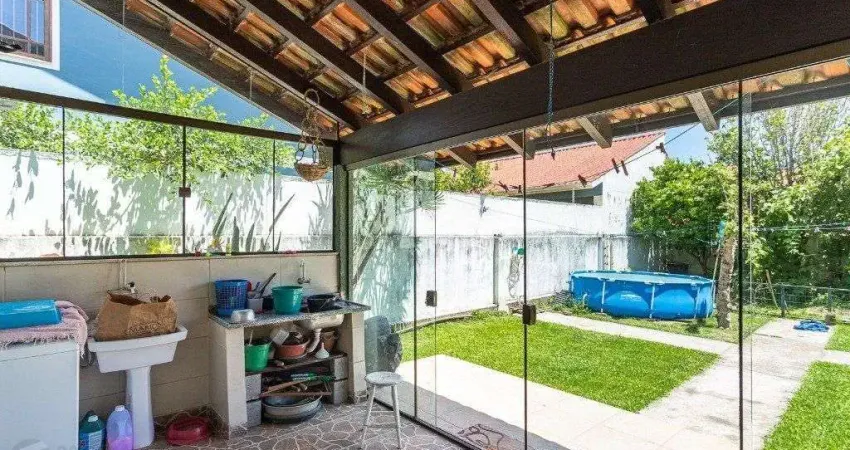 Casa com 4 quartos à venda na Rua Jayme Saul de Borba, 108, Espírito Santo, Porto Alegre