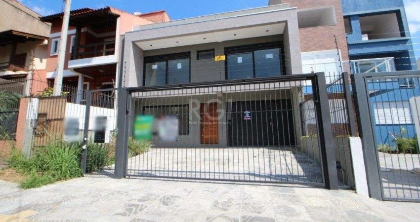 Casa com 3 quartos à venda na Rua Buarque de Macedo, 1017, São Geraldo, Porto Alegre