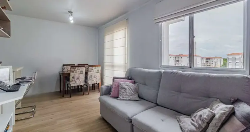 Apartamento com 2 dormitórios e 1 vaga de garagem escriturada no Bairro Humaitá