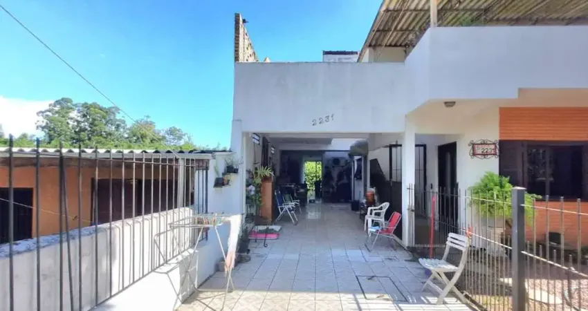 Casa com 5 quartos à venda na Avenida Vicente Monteggia, 2281, Cavalhada, Porto Alegre